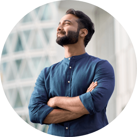 a man with arms crossed contemplating