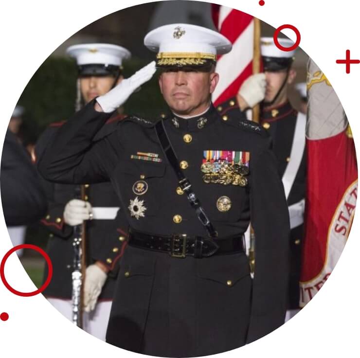 Retired Lt. General John Wissler, of the USMC, saluting at a formal military ceremony at Marine Barracks Washington D.C.