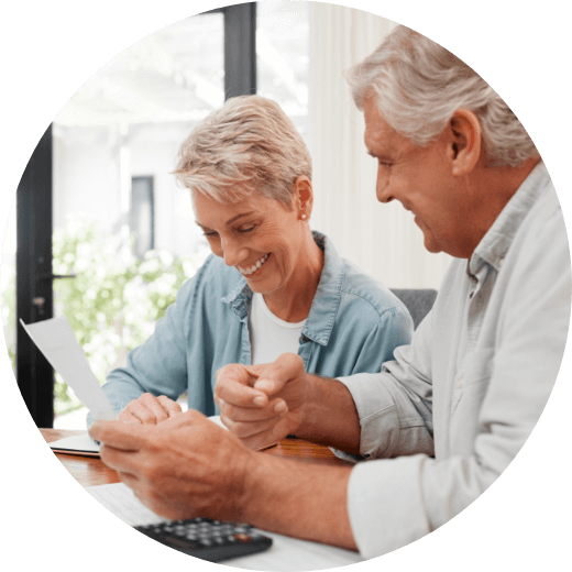 an old couple reviewing their paperwork