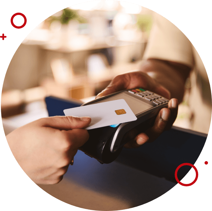 Person tapping a credit card on a payment terminal