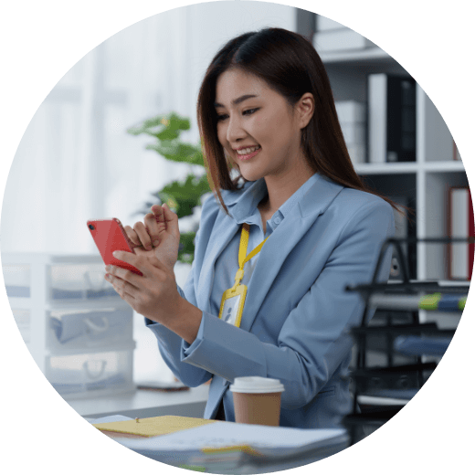 a woman working on her phone